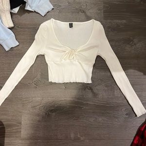 White long sleeved cropped top